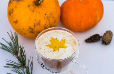 cup of coffee with pumpkins