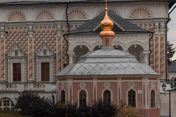 The Mikheyevskaya Church in the Trinity Lavra of st. Sergius against the Refectory Church of st Sergius by autumn day