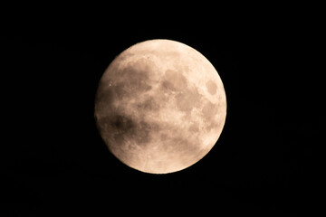 Obraz premium Liechtenstein, July 22, 2021 Full moon in the dark sky