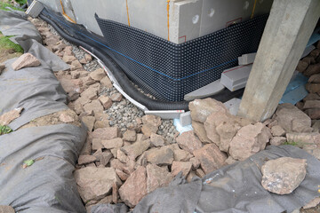 Foundation insulation and Damp proofing of House basement.