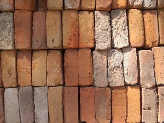 Stacked red brick wall for house