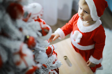 Merry bright christmas. Lovely baby enjoy christmas. Childhood memories. Santa girl little child...