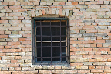 Fototapeta na wymiar Old brick wall and window