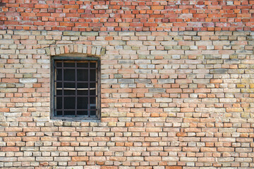 Fototapeta na wymiar Old brick wall and window