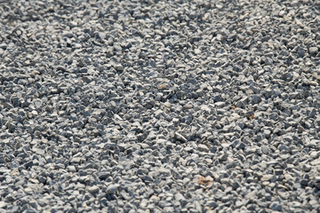 Gravel on the path. Gray stones. Gravel used in making th walk sidewalk