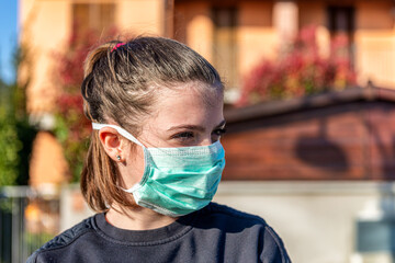 Young girl durin lockdown for Covid-19, Italy.