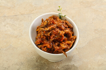 Canned anchovy in tomato sauce