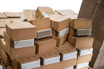 amazon packaging cardboards - piles of empty boxes