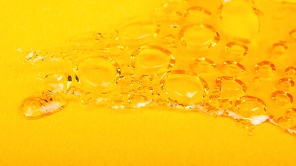 yellow cannabis wax concentrate close up, high thc resin