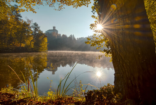 Beautiful autumn landscape scenery of Trakošćan Castle on the hill reflected in the lakes surrounded with forest in Croatia, county hrvatsko zagorje © Karlo