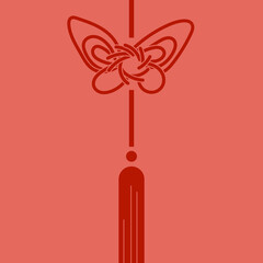 Chinese knot is a wish of good luck. Red knot in the form of a butterfly on a red background.