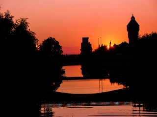 Red Bega River in Timisoara, Late skyline view in European City 