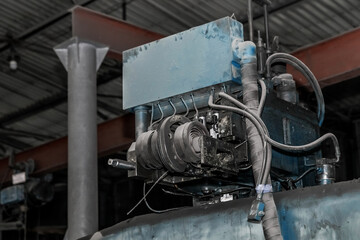 Old machine tools and equipment in the workshop of an industrial plant for metalworking