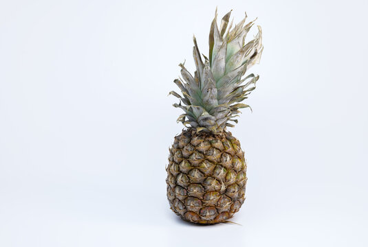 Ripe pineappl, ananas on a white background healthy life concept © SunnyRed