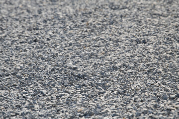 Gravel on the path. Gray stones. Gravel used in making th walk sidewalk