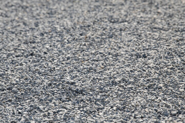 Gravel on the path. Gray stones. Gravel used in making th walk sidewalk
