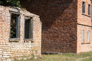An old abandoned dilapidated house with brick walls