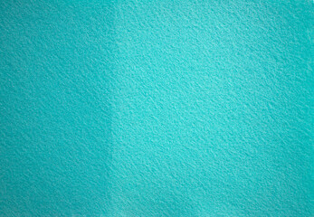 Blue texture of soft cardboard. Clear blue background. A clean place for a congratulatory text. - obrazy, fototapety, plakaty