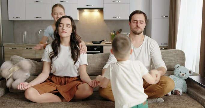 Kids bothering meditating parents at home