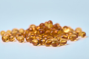 Omega 3 capsules on a light background