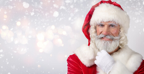 Portrait of Santa Claus on light background with space for text