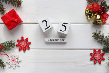 Christmas concept. Festive table with Christmas decorations and calendar dated December 25