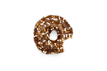 Creative concept of biting eating delicious sweet sugar brown black doughnut donut with glaze on white background. Top view flat lay unhealthy dessert, Food concept, mock up