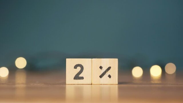 wooden cubes with the number 2 percent. business concept. marketing concept