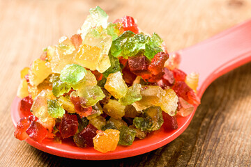 Candied fruit mixture on spoon