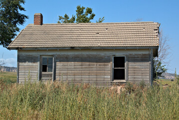 Abandoned wood frame farm home
