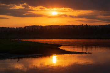 Orange Sunset reflecting on marsh
