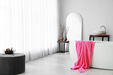 Interior of modern bathroom with mirror and light curtains © Pixel-Shot