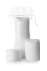 Many round cotton pads on white background