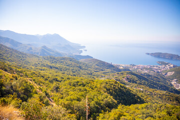 Obraz premium Summer Budva riviera coastline panorama landscape in Montenegro. View from the top of the mountain road.
