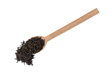 yunnan black tea on wooden spoon isolated on white background.