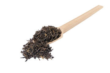 yunnan black tea on wooden spoon isolated on white background.
