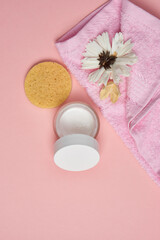 Obraz na płótnie Canvas hygiene items skin care aromatherapy pink background