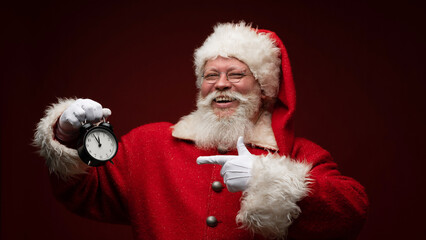 Santa claus with alarm clock
