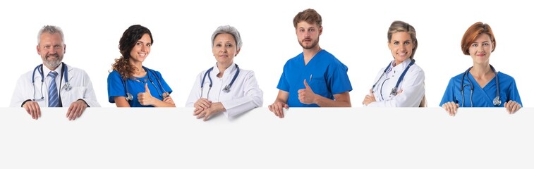 Medical team holding a blank poster