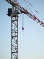 Construction crane on a construction site used for the construction of residential houses © Michal