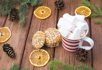 sweet hot cocoa with marshmallows, winter christmas drink on wooden background.