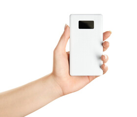 Woman holding modern power bank on white background