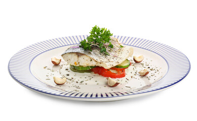 Plate of tasty sea bass fish with vegetables on white background
