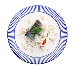 Plate of tasty sea bass fish with vegetables on white background