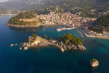 Aerial shot of church on island at the port town of Parga in West Greece Preveza