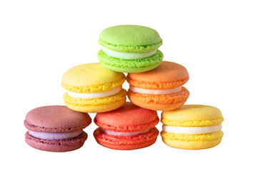 multicolored macaroons are stacked in a pyramid on the white background, isolated