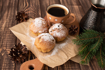 cupcakes with a cup of coffee, pine cones, clock