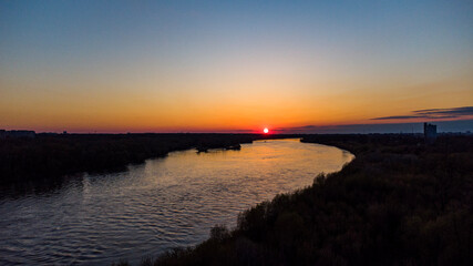 Obraz premium sunset over the river