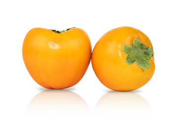 Two persimmon fruits isolated on white background.