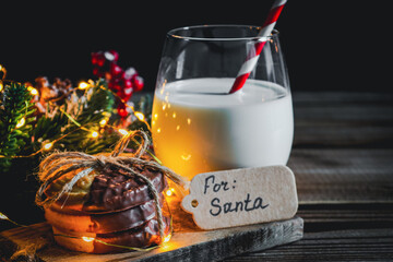 Cookie with milk on the table for Santa Claus